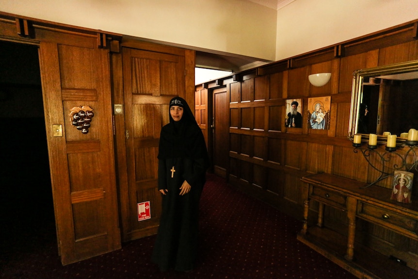 Mother Veronica stands in the foyer of the former hotel, now home to two Coptic nuns.