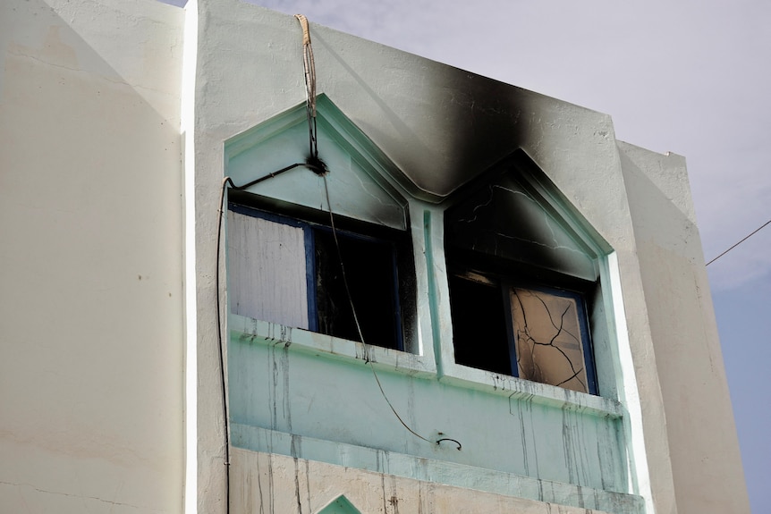 The charred remains of the hospital window