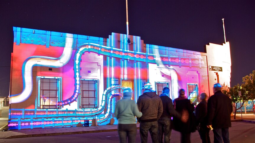 Images are projected onto heritage buildings in Port Adelaide as part of The Port Festival.