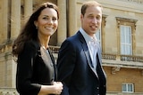 Royal couple stroll through palace