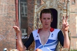 On top ... Bradley Wiggins celebrates after winning the men's time trial gold
