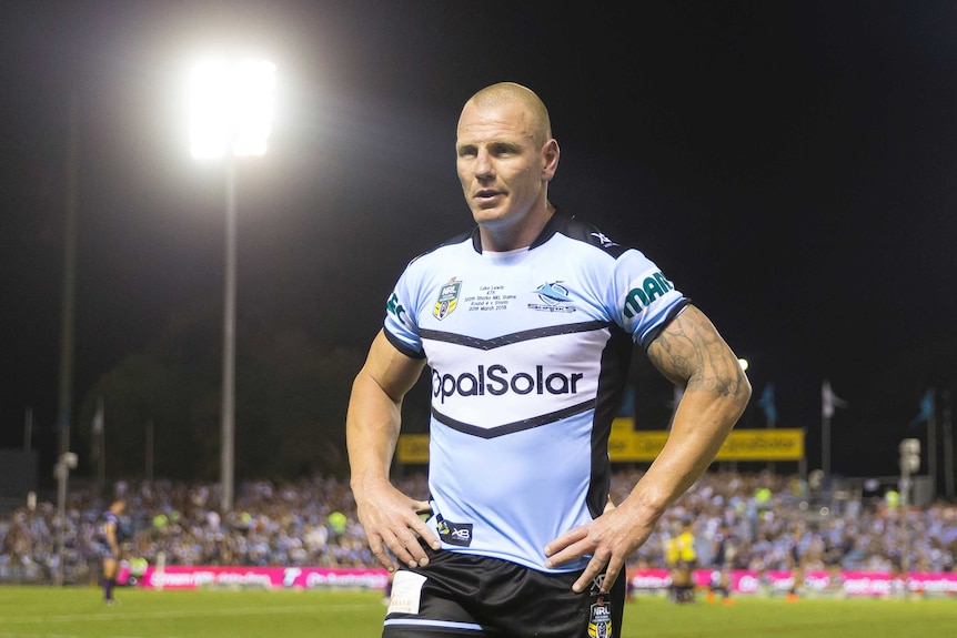 Luke Lewis has his hands on his hips as he leaves the field after being sin-binned