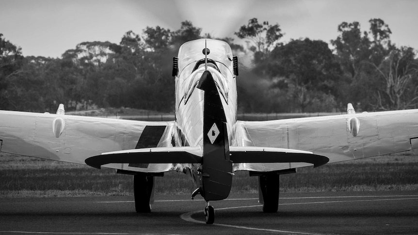 black and white image of a spitfire aircraft