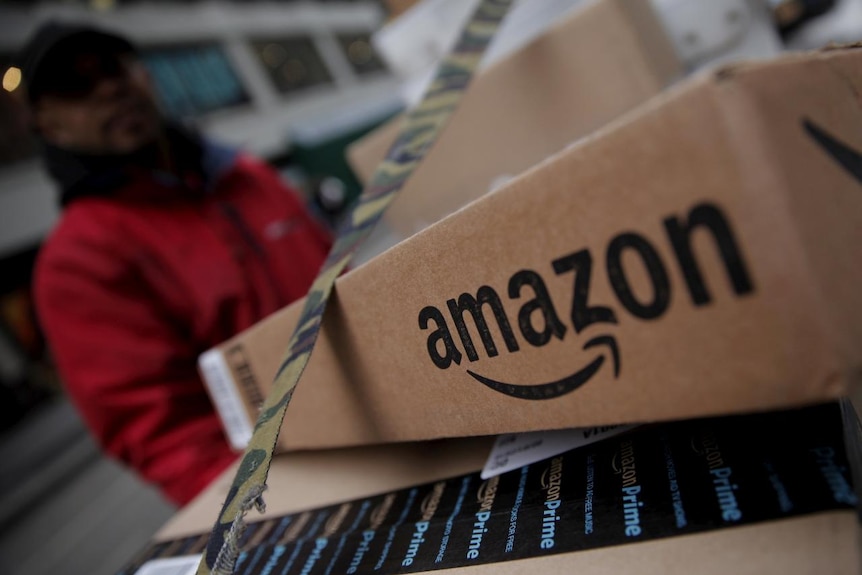 Amazon boxes are seen stacked for delivery in the Manhattan borough of New York City, January 29, 2016.