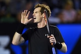 First through ... Andy Murray reacts to a point against Tomas Berdych