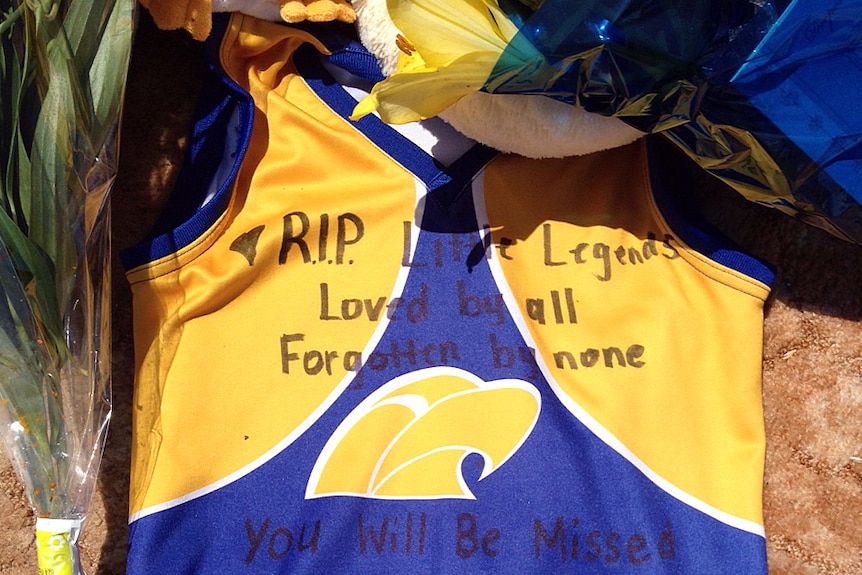 Football jumper tribute left at Port Lincoln for Little family
