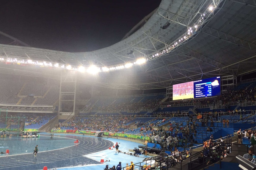 Rain falls at the Rio 2016 Olympic stadium