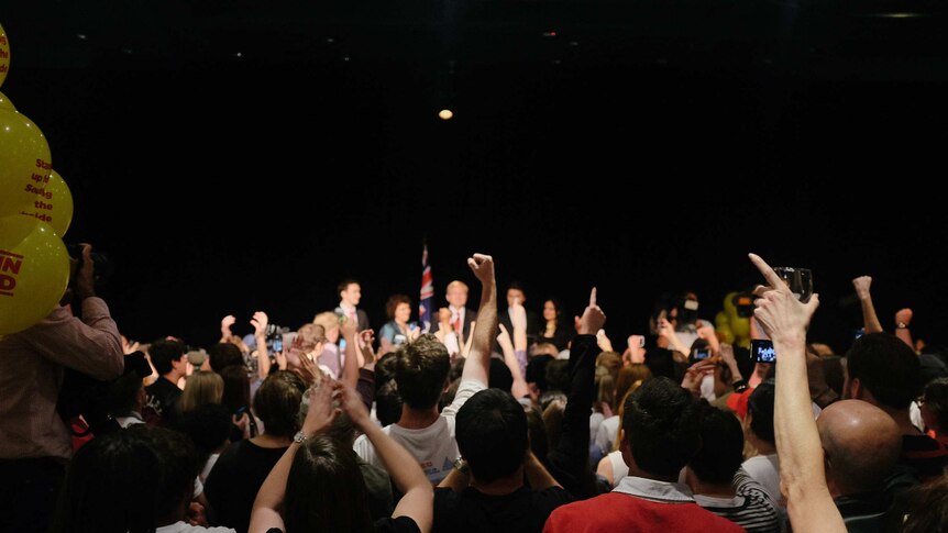 The crowd cheers for Kevin Rudd during his concession speech.