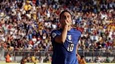 Francesco Totti celebrates the late goal which put Australia out of the World Cup