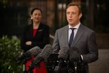 Queensland Health Minister Steven Miles with Premier Annastacia Palaszczuk at parliament house in Brisbane.