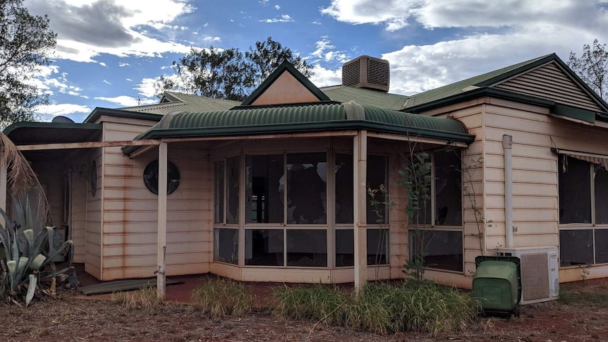 A home in Newman, WA, in a state of disrepair.