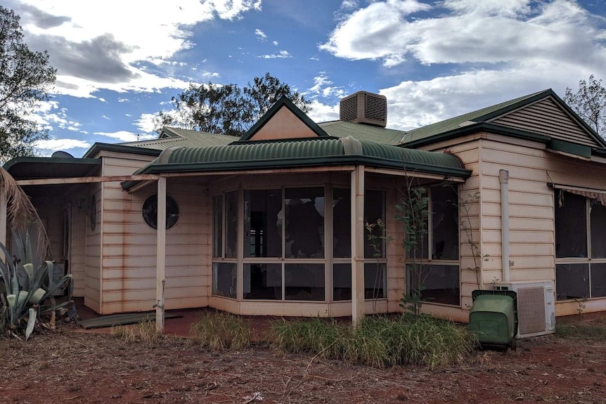 A home in Newman, WA, in a state of disrepair.