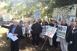 A protest outside NSW parliament against local government amalgamations.