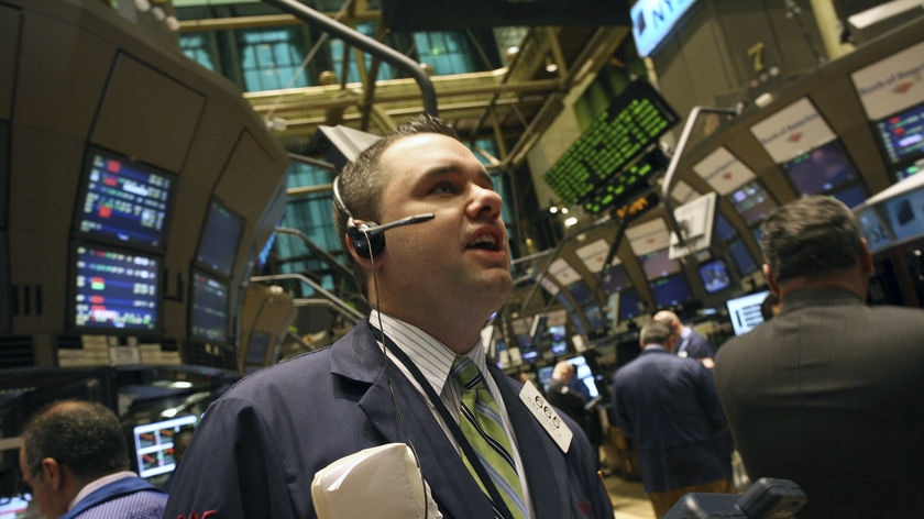 A trader works on the floor of the New York Stock Exchange