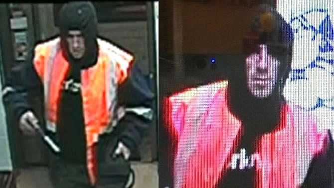 Robber in high visibility vest