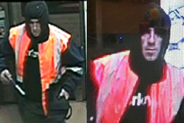Robber in high visibility vest