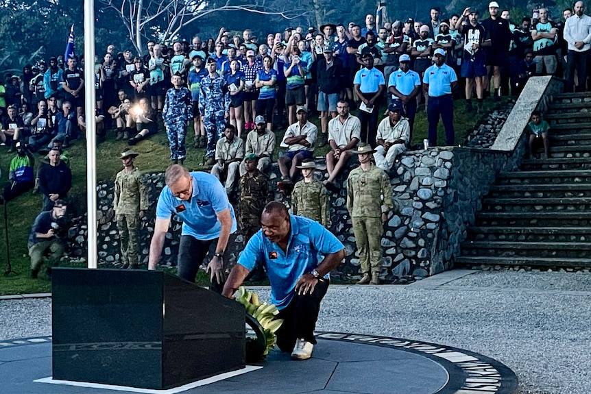 Anthony Albanese and PNG Prime Minister James Marape  lay at wreath at an ANZAC service. 