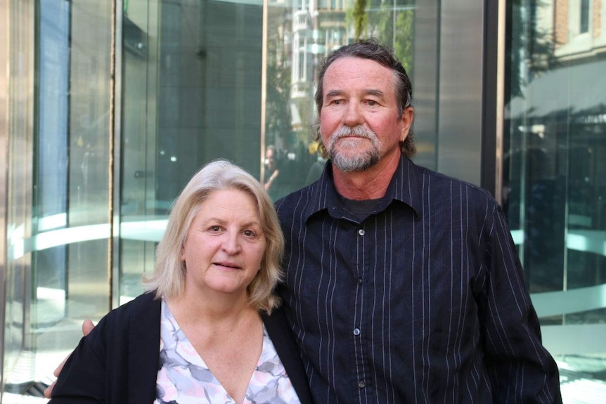 Sandra and Garry Elwood outside court.
