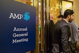 AMP shareholders walk past AGM sign, Melbourne Grand Hyatt