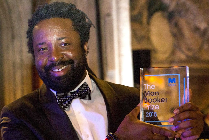 Marlon James, with his Man Booker Prize for Fiction award at the presentation ceremony in London.