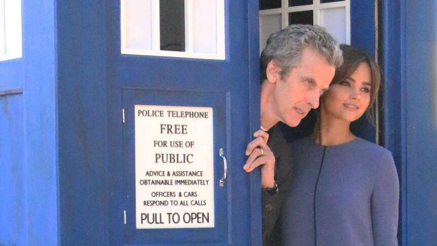 Dr  Who (Peter Capaldi) and Clara Oswald (Jenna Coleman) inside the Tardis next to Sydney Harbour.