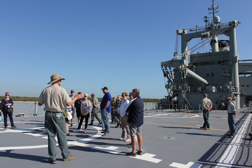 Daniel Clifton, from the QPWS, touring a group around the ex-HMAS Tobruk at the Bundaberg Port in September 2016.