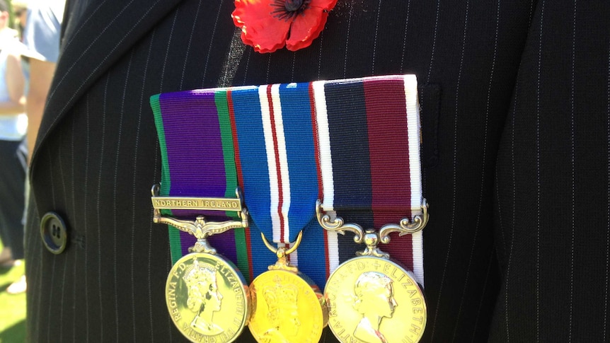 Close up of service medals and red poppy, Kings Park War Memorial, WA