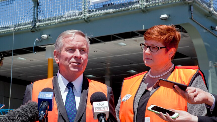 Premier Colin Barnett stands alongside the Federal Defence Minister Marise Payne