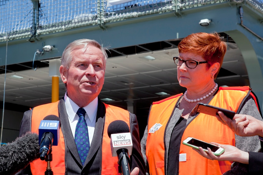 Premier Colin Barnett stands alongside the Federal Defence Minister Marise Payne