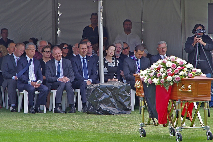 Mourners including the Governor and Premier at a funeral service for Josie Agius