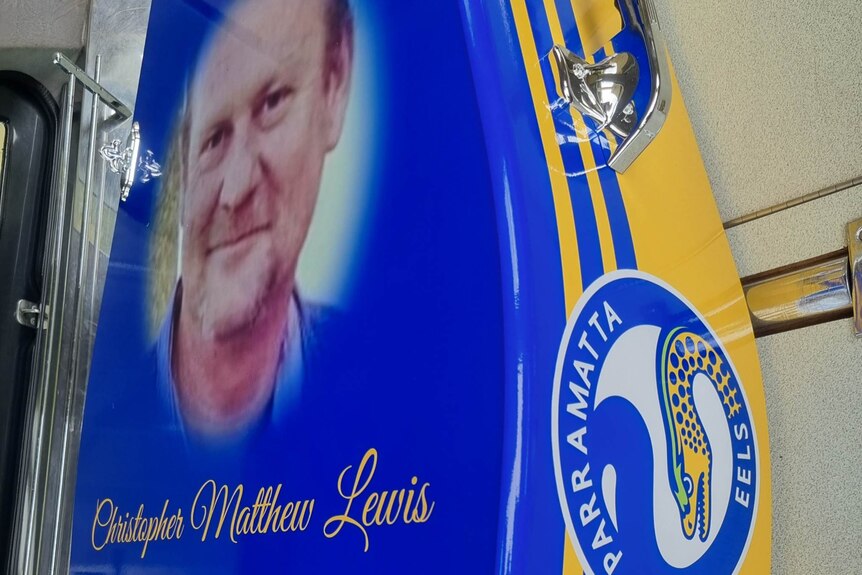 Close-up of Chris Lewis's face on the Parramatta Eels coffin.