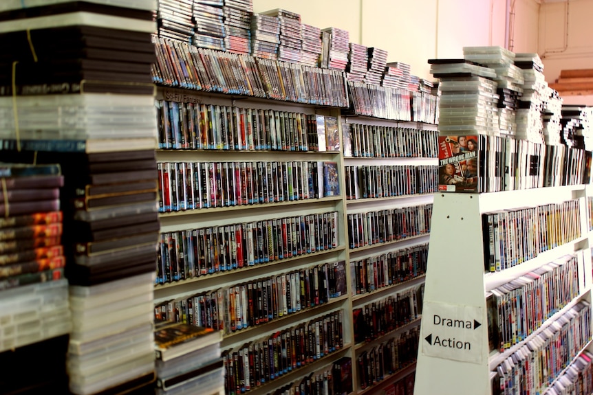 Thousands of DVDs on shelves at a store