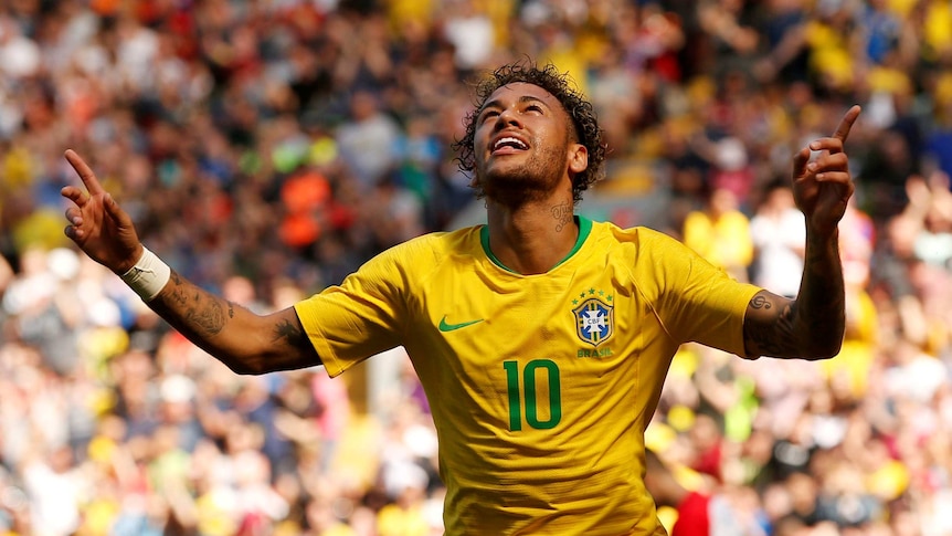 Neymar celebrates scoring Brazil's first goal against Croatia.