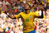 Neymar celebrates scoring Brazil's first goal against Croatia.