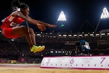 Brittney Reese leaps to gold in the women's long jump final.