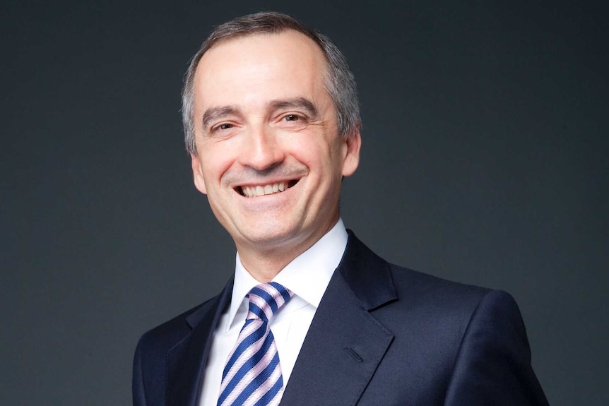 CEO of Virgin Australia John Borghetti stands and smiles