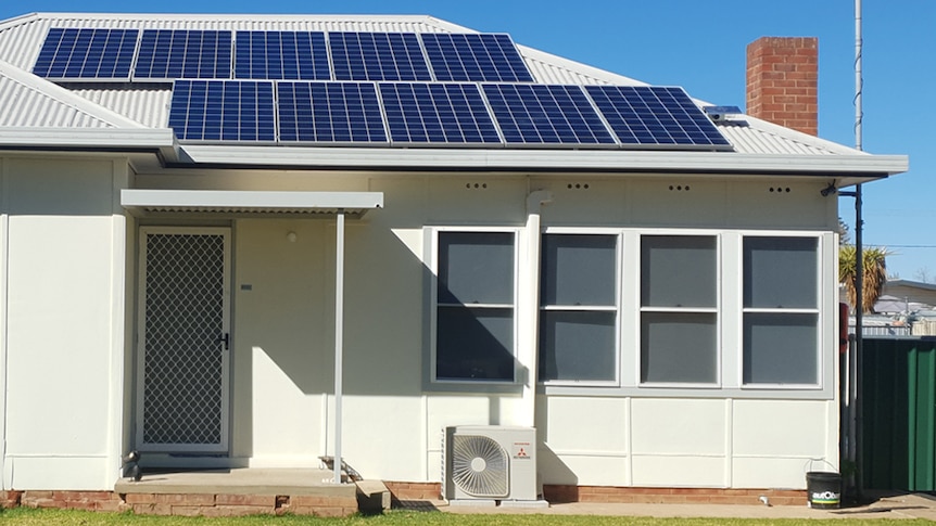 White house with solar panels