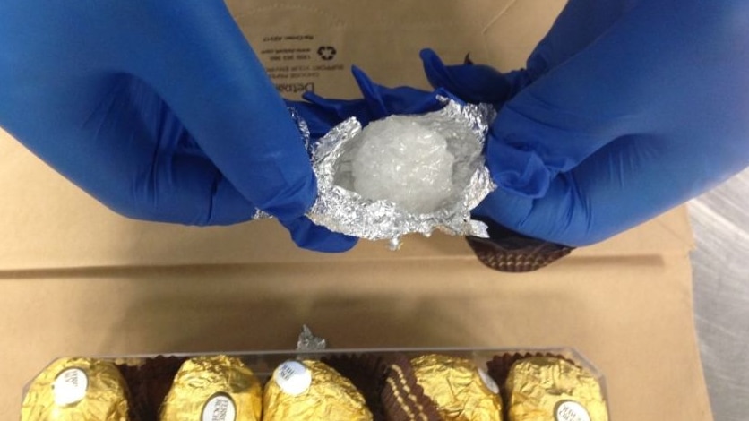 Police allegedly found the drug ice hidden inside chocolate wrappers