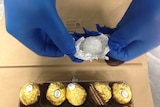 Police allegedly found the drug ice hidden inside chocolate wrappers
