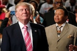 Republican presidential nominee Donald Trump attends a church service, in Detroit, Michigan, U.S., September 3, 2016.