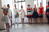 Models line up backstage before the Kate Spade Spring/Summer 2014 collection.