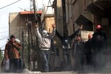 Syrian protesters gather after riot