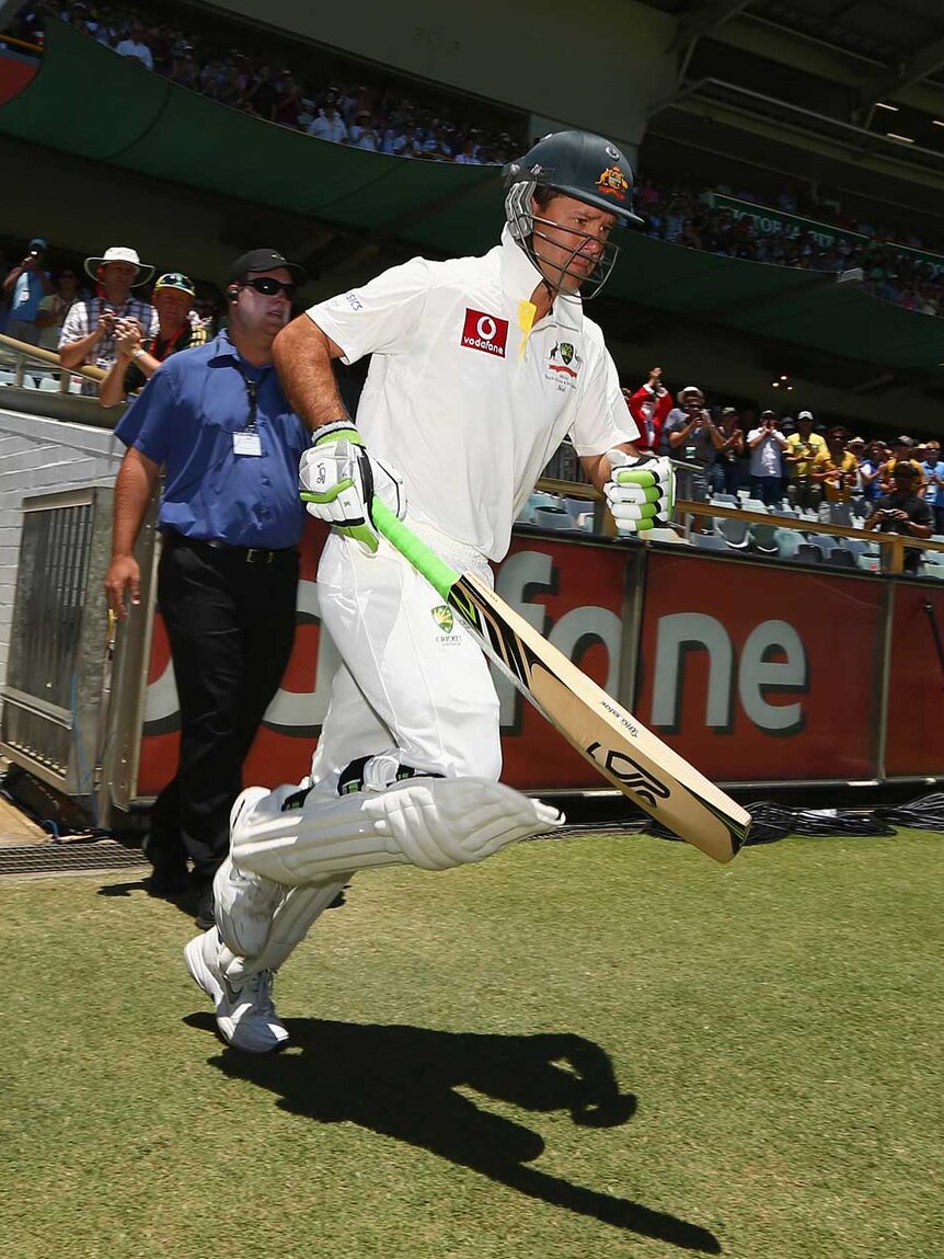 Last goodbye... Ricky Ponting enters the field for his final Test innings.