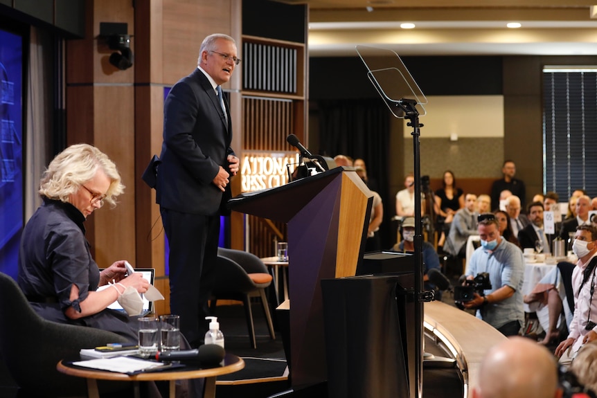 Scott Morrison delivering a speech alongside Laura Tingle at the National Press Club