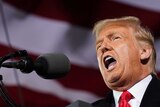 President Donald Trump speaks at a campaign rally at Des Moines International Airport