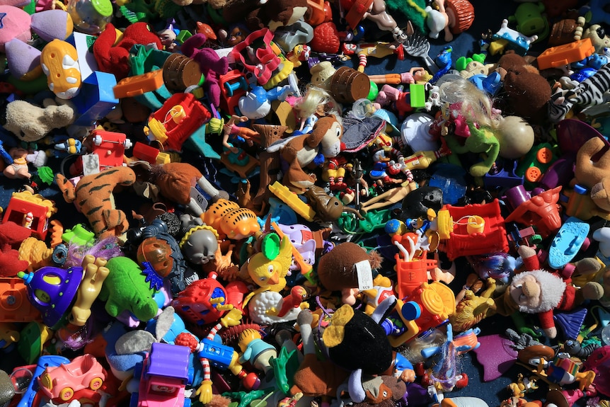 A big pile of discarded plastic children's toys.