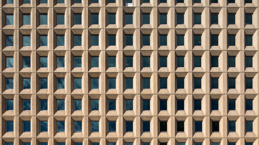 the windows of a concrete modern building