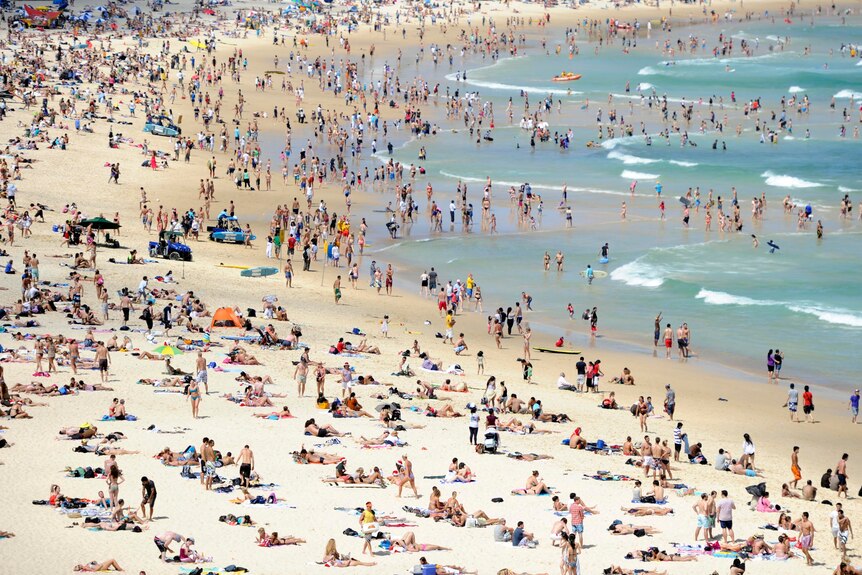 Beachgoers flock to Bondi Beach, Sydney.