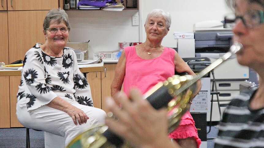 Life members Joy Connelly and Bronwyn Feltham watch the Gold Coast City Wind Orchestra