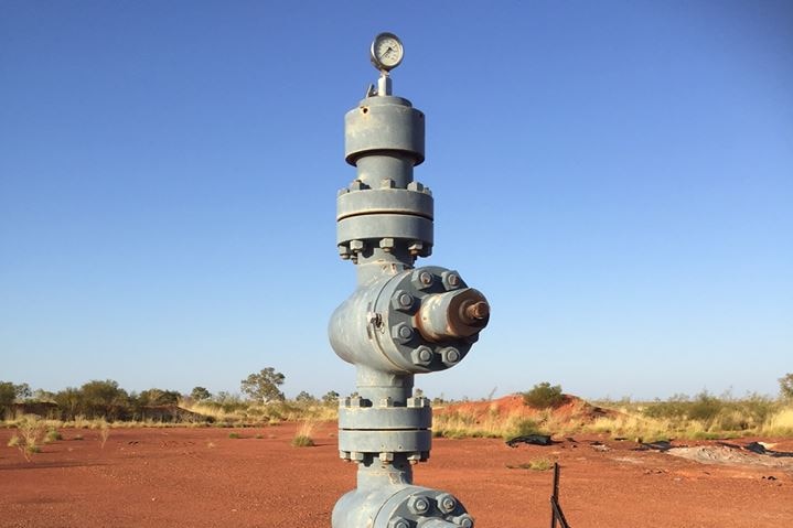A gas well in the desert.